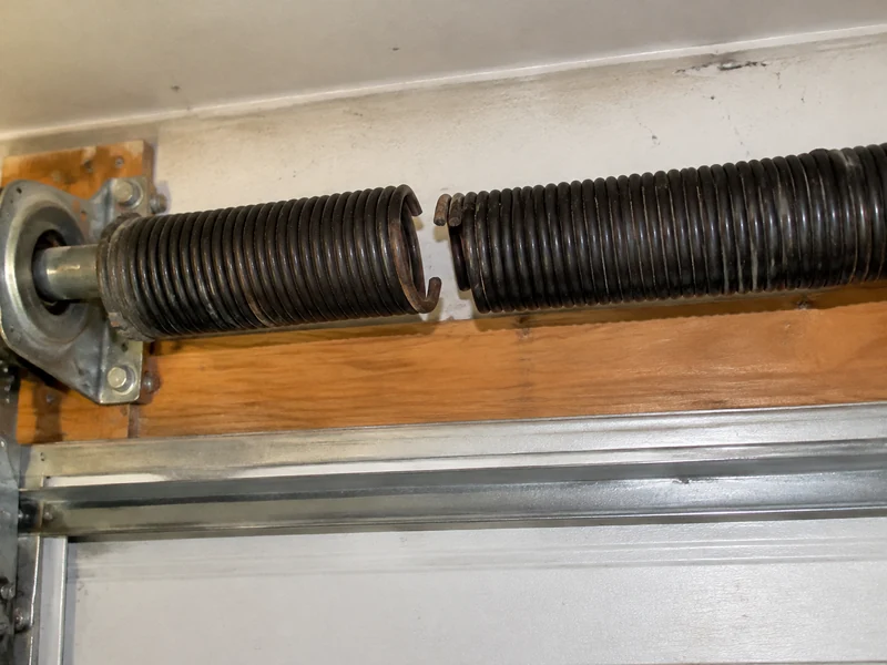 Garage door spring broke with a clear gap in the torsion coil