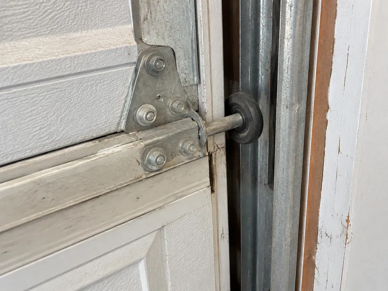 Garage door roller that has come out of its track