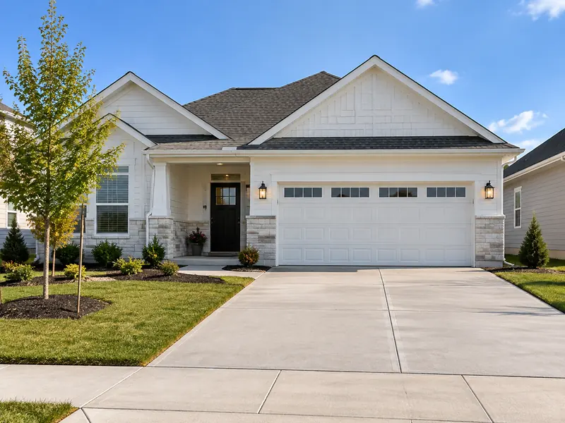 New home with a white two-car garage door